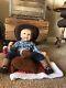 18 Sherry Rawn Baby Cowboy Doll with Saddle Display The Ashton-Drake Galleries