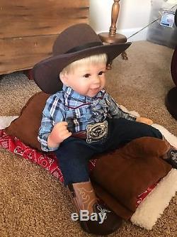 18 Sherry Rawn Baby Cowboy Doll with Saddle Display The Ashton-Drake Galleries