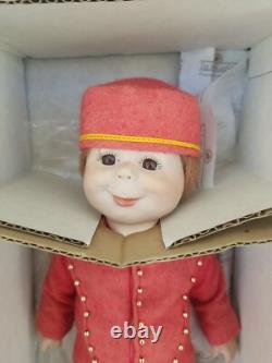 Ashton Drake Galleries WRAPPED UP FOR CHRISTMAS DOLL LIMITED EDITION