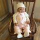 Ashton Drake partial Silicone baby fully clothed. Carter's outfit, socks, hat