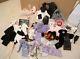 Assortment of Ashton-Drake Gene Doll clothes outfits and accessories