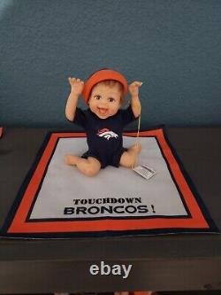 Complete set of 12 Ashton-Drake Denver Broncos collectible baby dolls