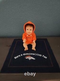 Complete set of 12 Ashton-Drake Denver Broncos collectible baby dolls