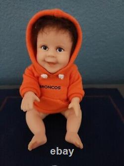 Complete set of 12 Ashton-Drake Denver Broncos collectible baby dolls