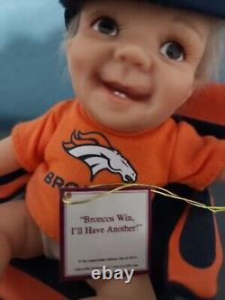 Complete set of 12 Ashton-Drake Denver Broncos collectible baby dolls