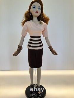 Gene Doll From The Ashton Drake Collection plus Three Outfits