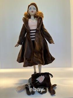 Gene Doll From The Ashton Drake Collection plus Three Outfits