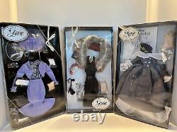 Gene Doll From The Ashton Drake Collection plus Three Outfits