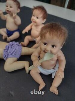 LOT OF 4 DOLLS -Ashton drake Daddy's baby's-Realistic looking? Deal