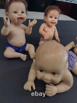 LOT OF 4 DOLLS -Ashton drake Daddy's baby's-Realistic looking? Deal