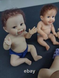 LOT OF 4 DOLLS -Ashton drake Daddy's baby's-Realistic looking? Deal