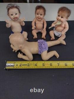 LOT OF 4 DOLLS -Ashton drake Daddy's baby's-Realistic looking? Deal