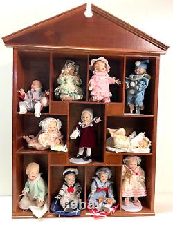 Lot of 11 Ashton Drake Galleries Porcelain Mini Baby Dolls with Display