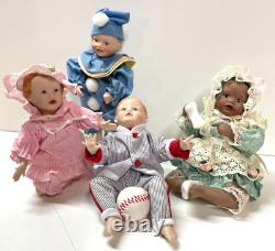 Lot of 11 Ashton Drake Galleries Porcelain Mini Baby Dolls with Display