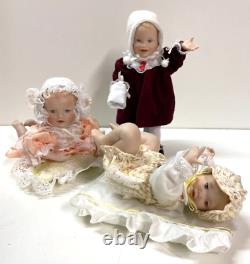Lot of 11 Ashton Drake Galleries Porcelain Mini Baby Dolls with Display