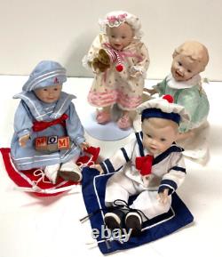 Lot of 11 Ashton Drake Galleries Porcelain Mini Baby Dolls with Display