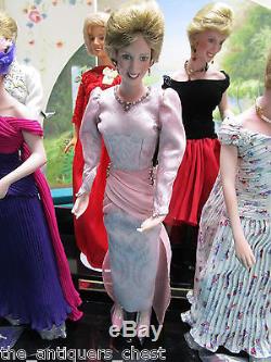 Princess Diana fashion Collection of 6 dolls in wooden stand