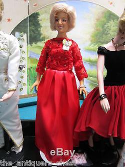 Princess Diana fashion Collection of 6 dolls in wooden stand