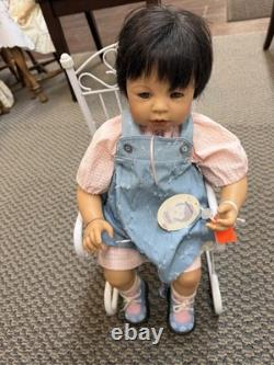 The Ashton-Drake Galleries Baby Doll Black Hair Pink Outfit Chair