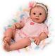 The Ashton Drake Galleries Ella Realistic Touch-Activated Weighted Baby Doll