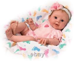 The Ashton-Drake Galleries Ella Realistic Touch-Activated Weighted Baby Doll