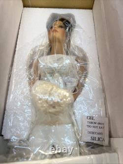 The Ashton-Drake Galleries Love Takes Wing Handcrafted Porcelain Doll Retired