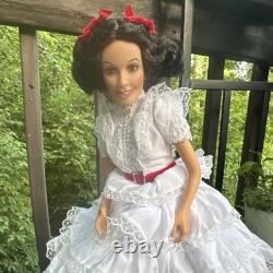 The Ashton-Drake Galleries Porcelain Girl Doll Black Curly Hair White Dress Col